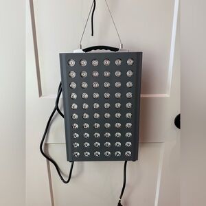 Hooga Red light with hanging equipment and glasses.